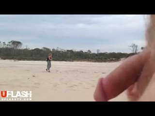flashing cock on the beach